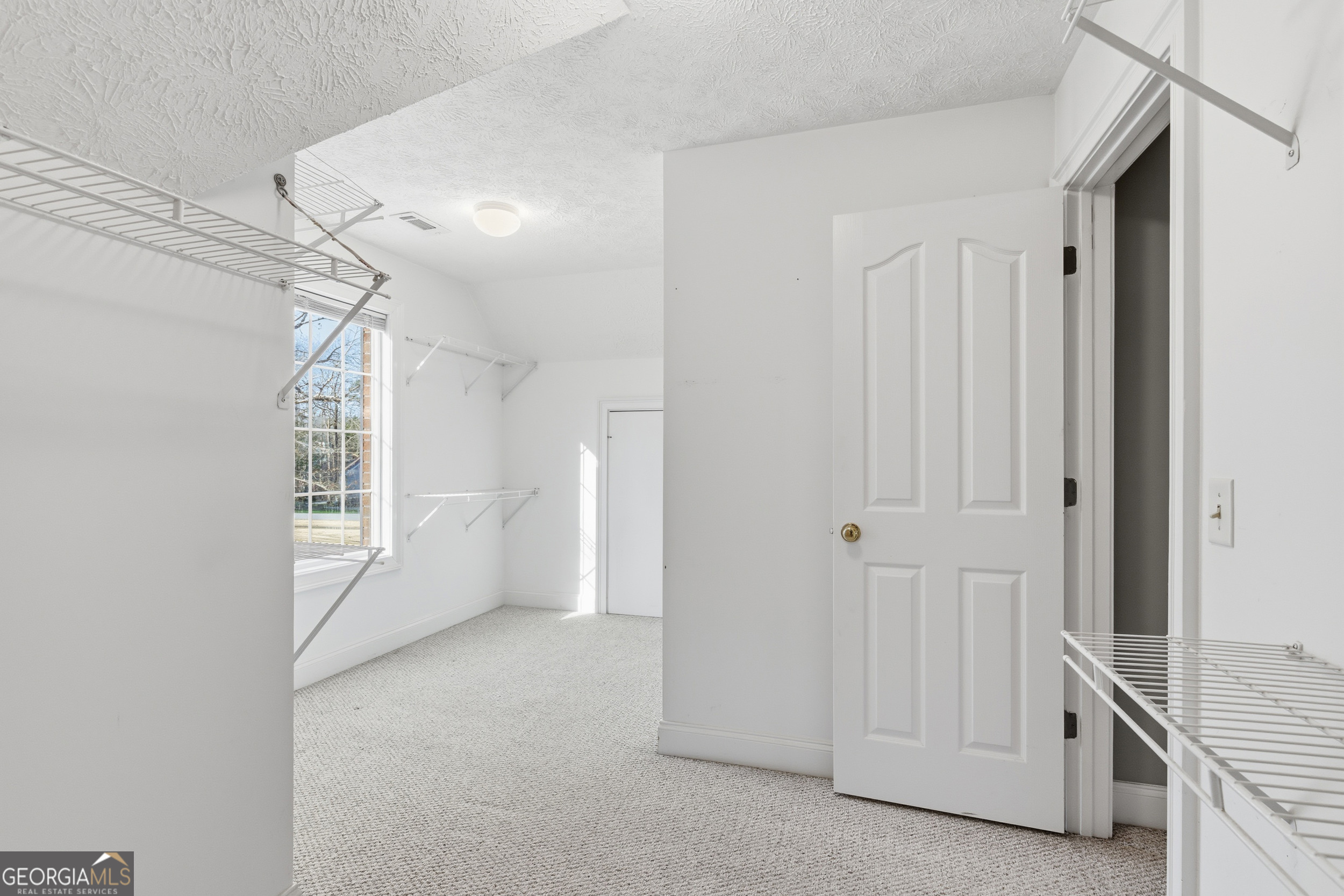 180 Springbrook Drive Cornelia, GA 30531 - Photo 26 of 50 a view of an empty room with a window
