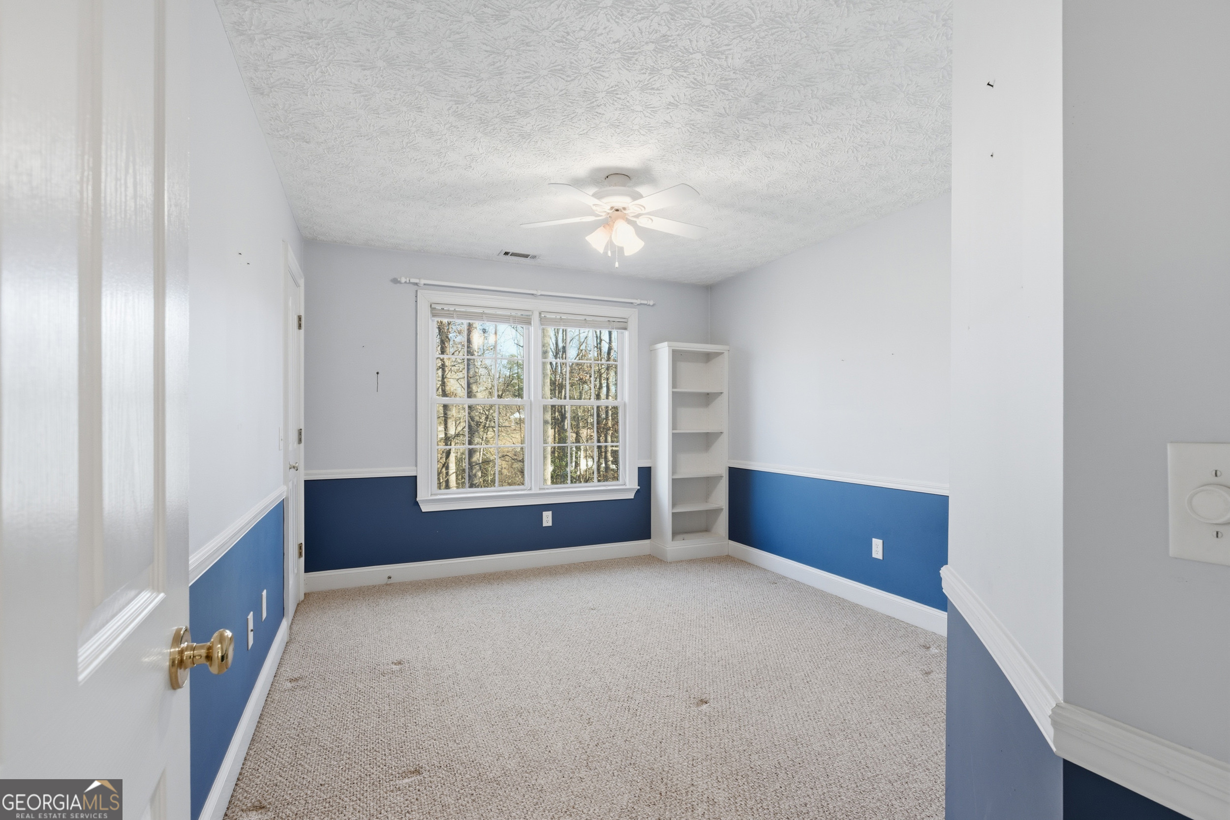 180 Springbrook Drive Cornelia, GA 30531 - Photo 28 of 50 an empty room with windows and closet
