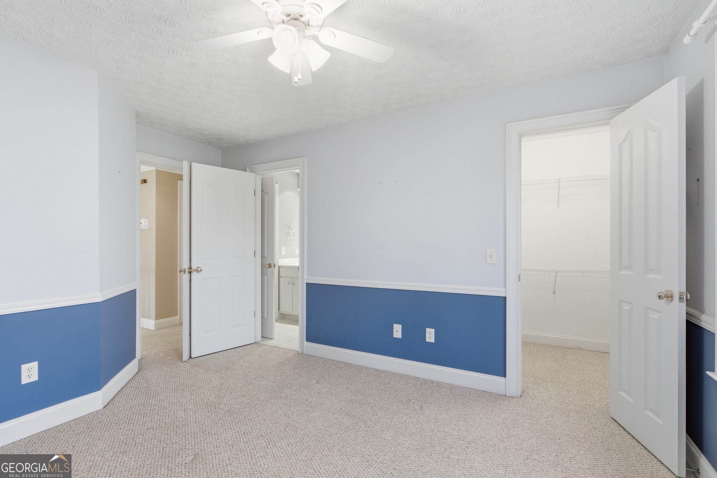 180 Springbrook Drive Cornelia, GA 30531 - Photo 29 of 50 a view of an empty room and chandelier fan