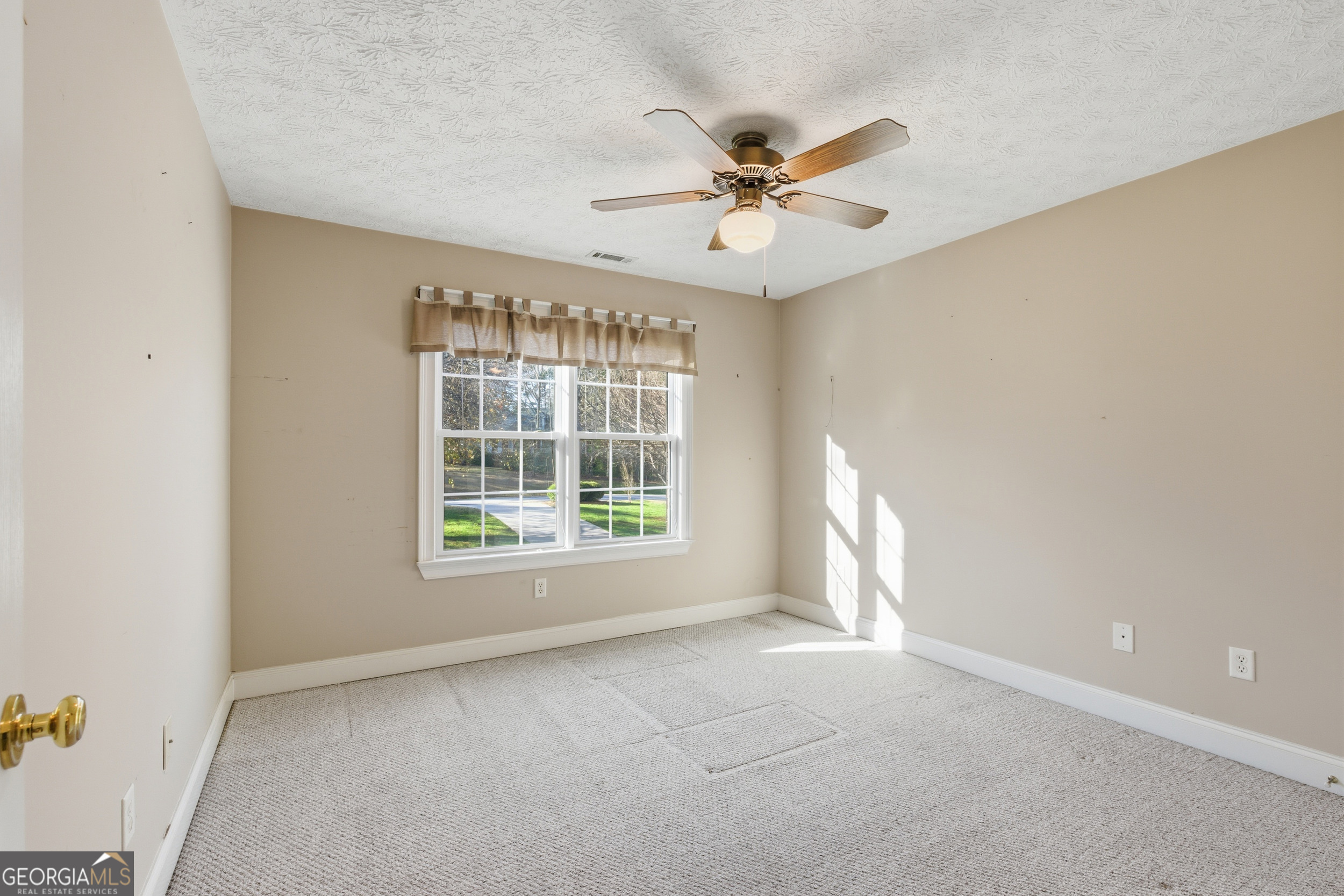 180 Springbrook Drive Cornelia, GA 30531 - Photo 30 of 50 a view of an empty room with a window