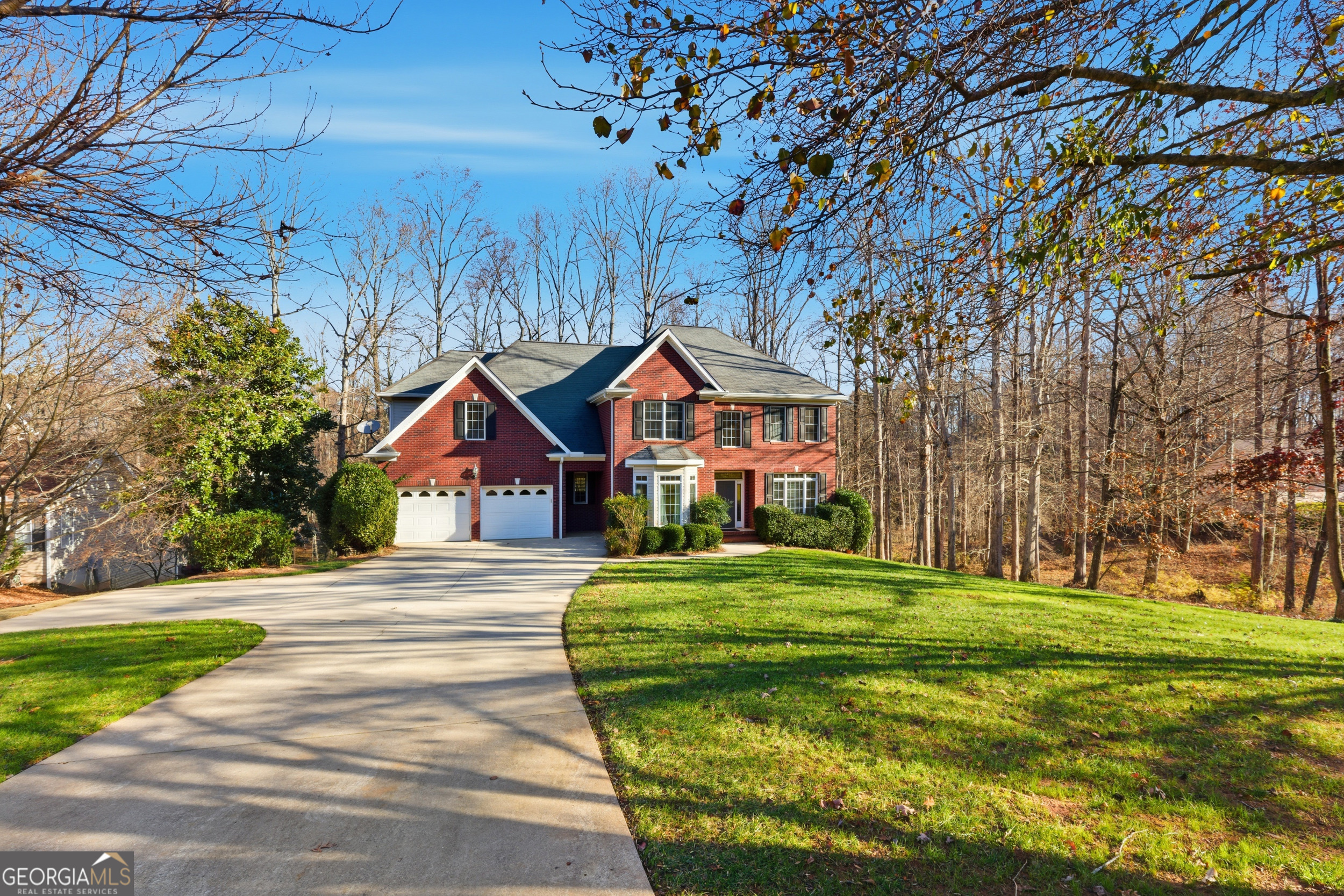 180 Springbrook Drive Cornelia, GA 30531 - Photo 3 of 50 a front view of a house with a yard