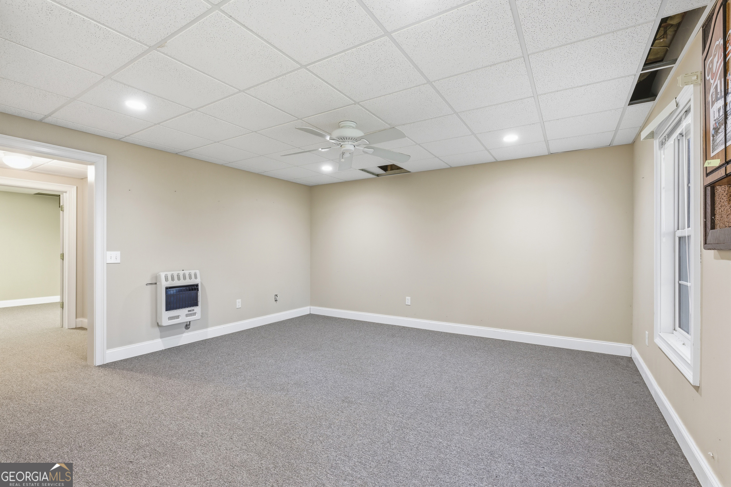 180 Springbrook Drive Cornelia, GA 30531 - Photo 40 of 50 an empty room with a empty space and windows
