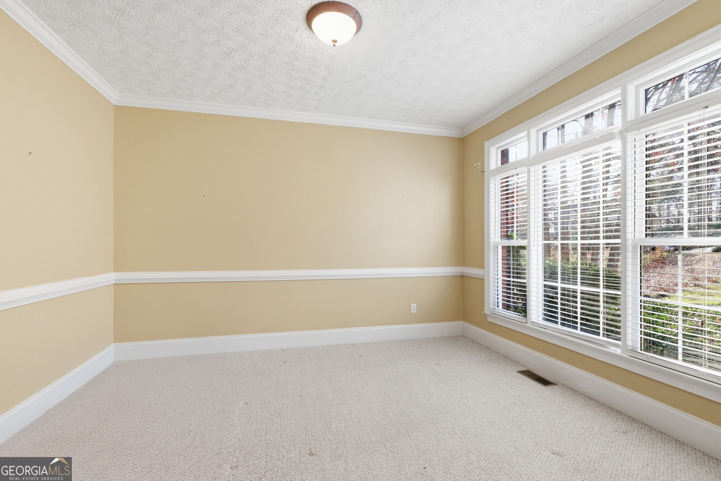 180 Springbrook Drive Cornelia, GA 30531 - Photo 6 of 50 a view of an empty room with a window
