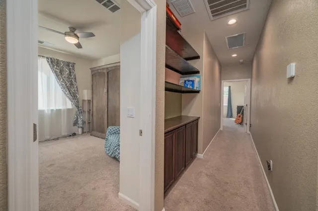 a kitchen with a sink and large window