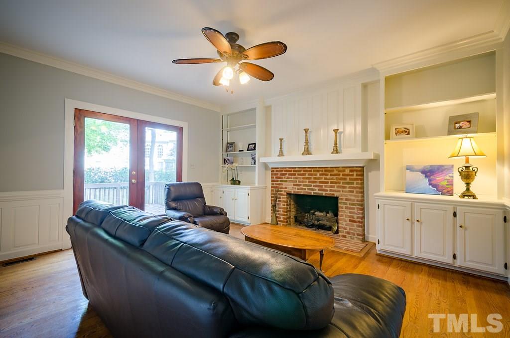 8212 Pepperidge Court Raleigh, NC 27615 - Photo 4 of 25 Beautiful Family Room with Trim Just Painted White