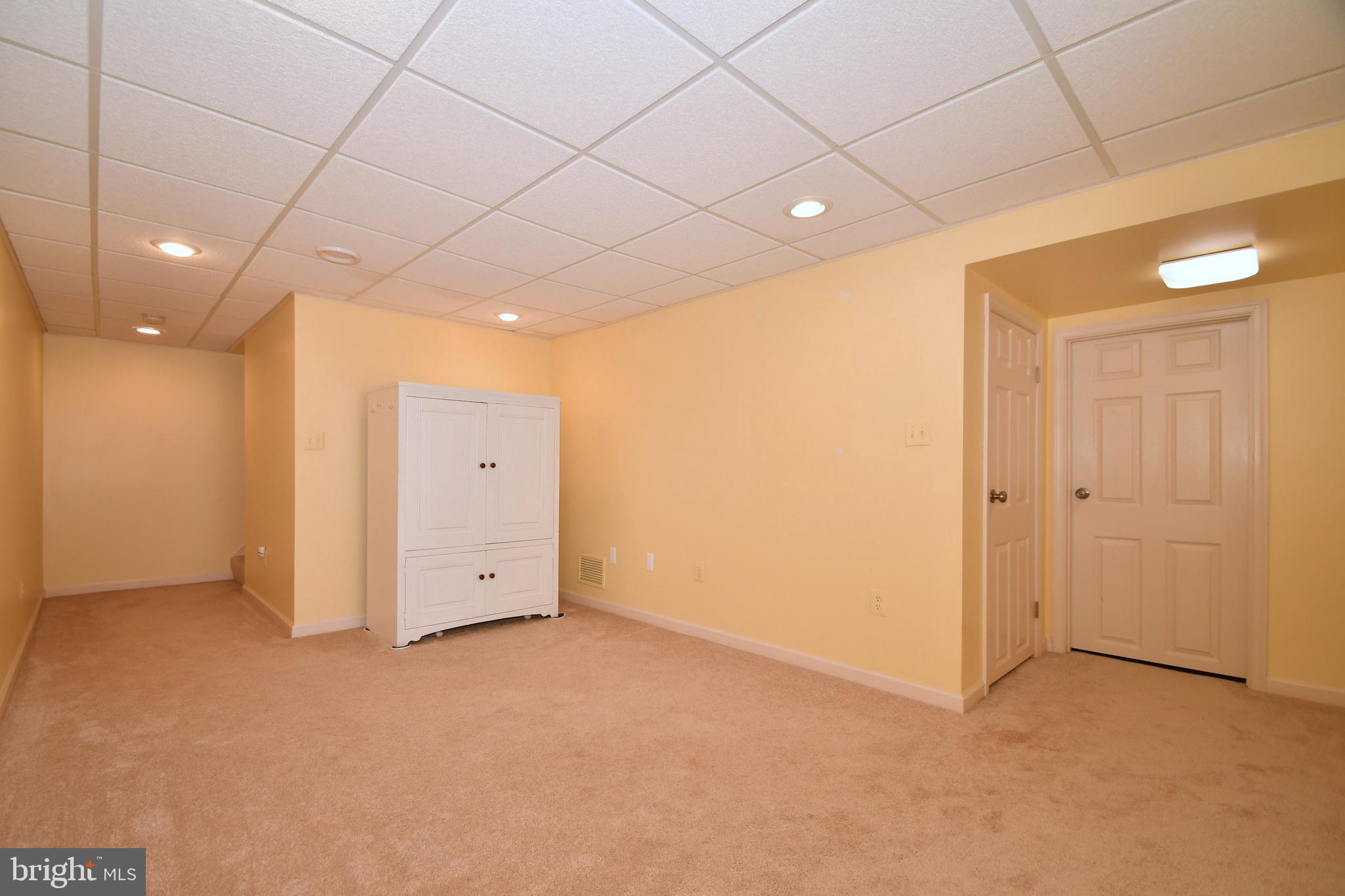 8715 Ridgelys Choice Drive Baltimore, MD 21236 - Photo 19 of 24 Lower level family room