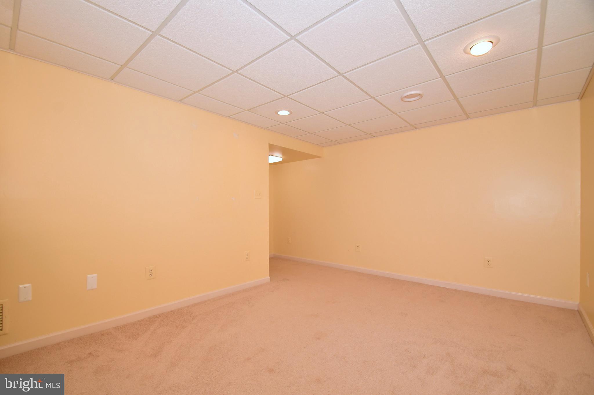 8715 Ridgelys Choice Drive Baltimore, MD 21236 - Photo 20 of 24 Lower level family room