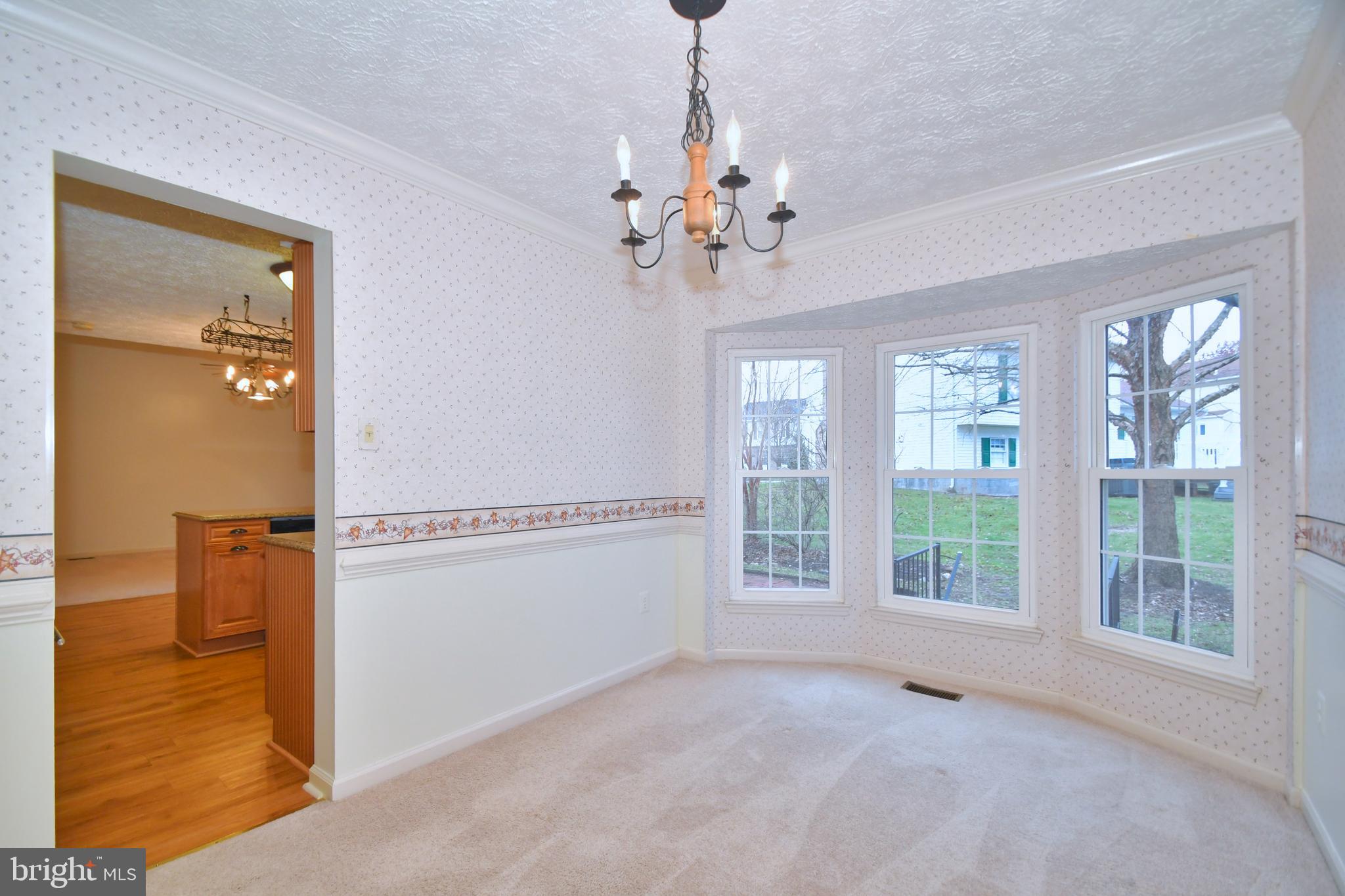 8715 Ridgelys Choice Drive Baltimore, MD 21236 - Photo 8 of 24 Dining room with bay window