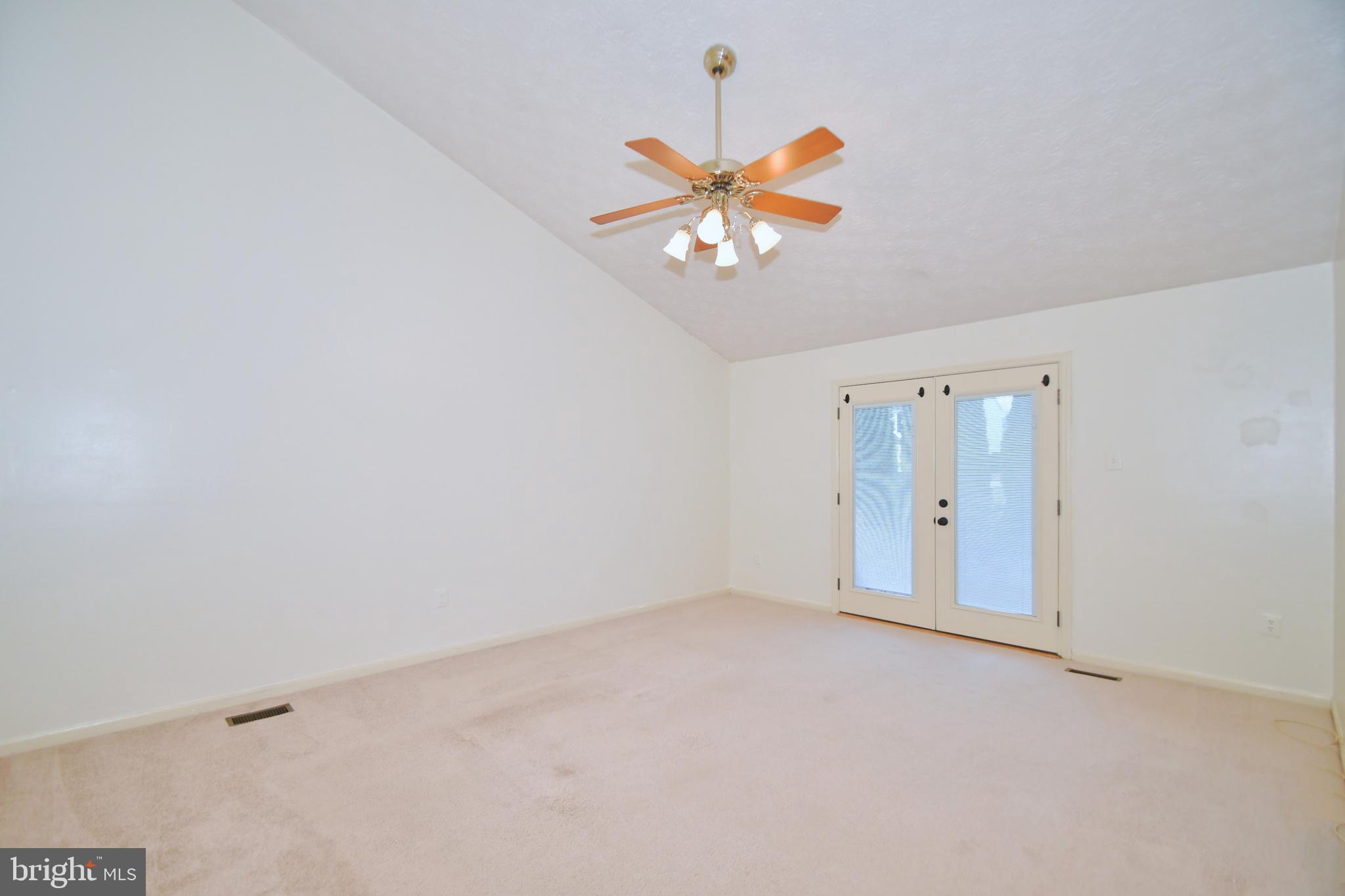 8715 Ridgelys Choice Drive Baltimore, MD 21236 - Photo 9 of 24 First floor family room with French doors to rear