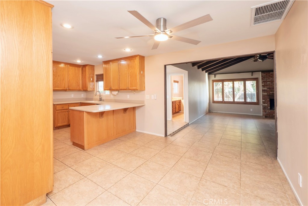 982 River Drive Norco, CA 92860 - Photo 11 of 41 a view of kitchen with windows and sink