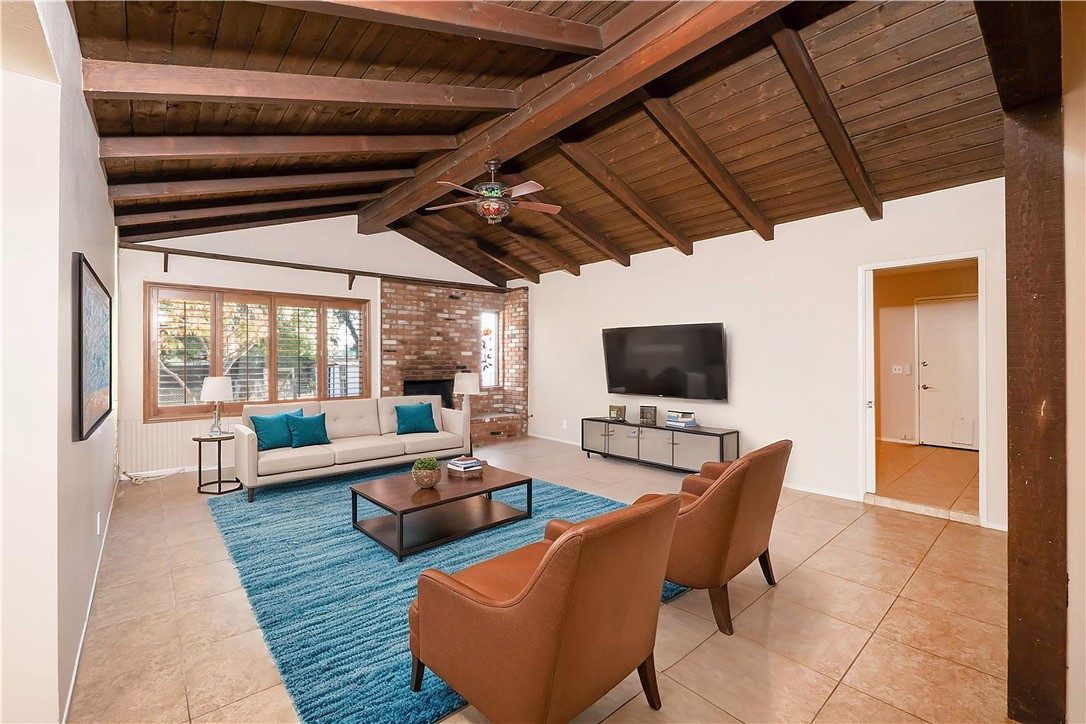 982 River Drive Norco, CA 92860 - Photo 14 of 41 a living room with furniture and a flat screen tv