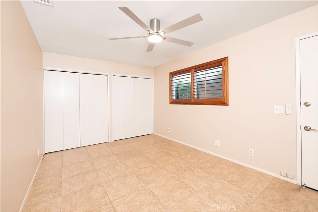 982 River Drive Norco, CA 92860 - Photo 18 of 41 an empty room with fan and windows