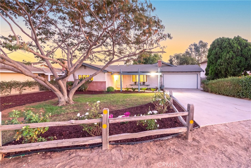 982 River Drive Norco, CA 92860 - Photo 2 of 41 a view of a yard with a tree