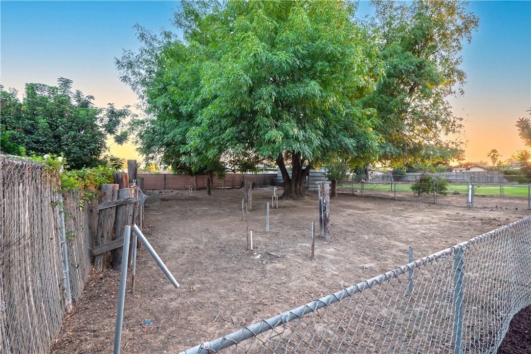 982 River Drive Norco, CA 92860 - Photo 36 of 41 a view of a backyard with wooden fence