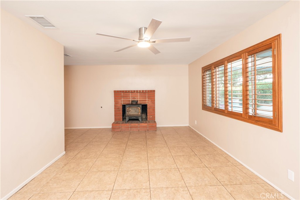 982 River Drive Norco, CA 92860 - Photo 9 of 41 a view of an empty room with a window