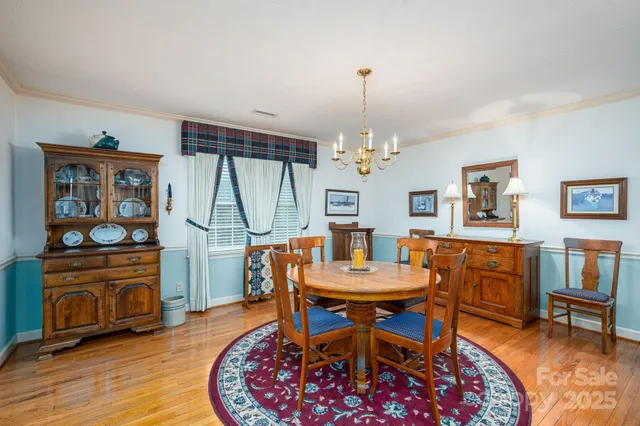 a workspace with furniture wooden floor and a rug