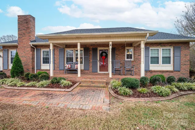 front view of a house with a small yard