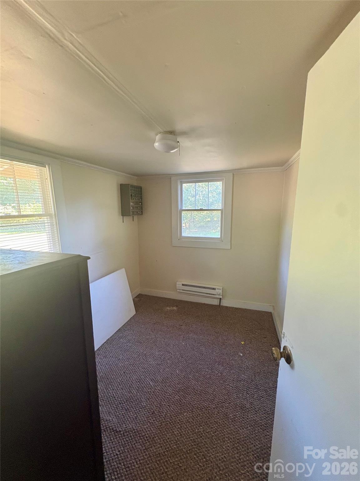 1105 John Miller Road Rockwell, NC 28138 - Photo 14 of 19 a view of an empty room with a window