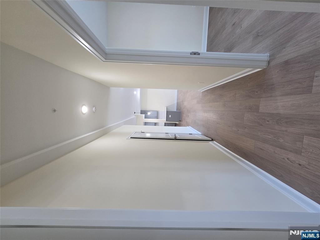 512 Kearny Avenue, Unit 202 Kearny, NJ 07032 - Photo 11 of 13 a view of hallway with wooden floor