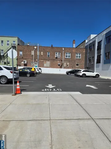 a view of a street with cars