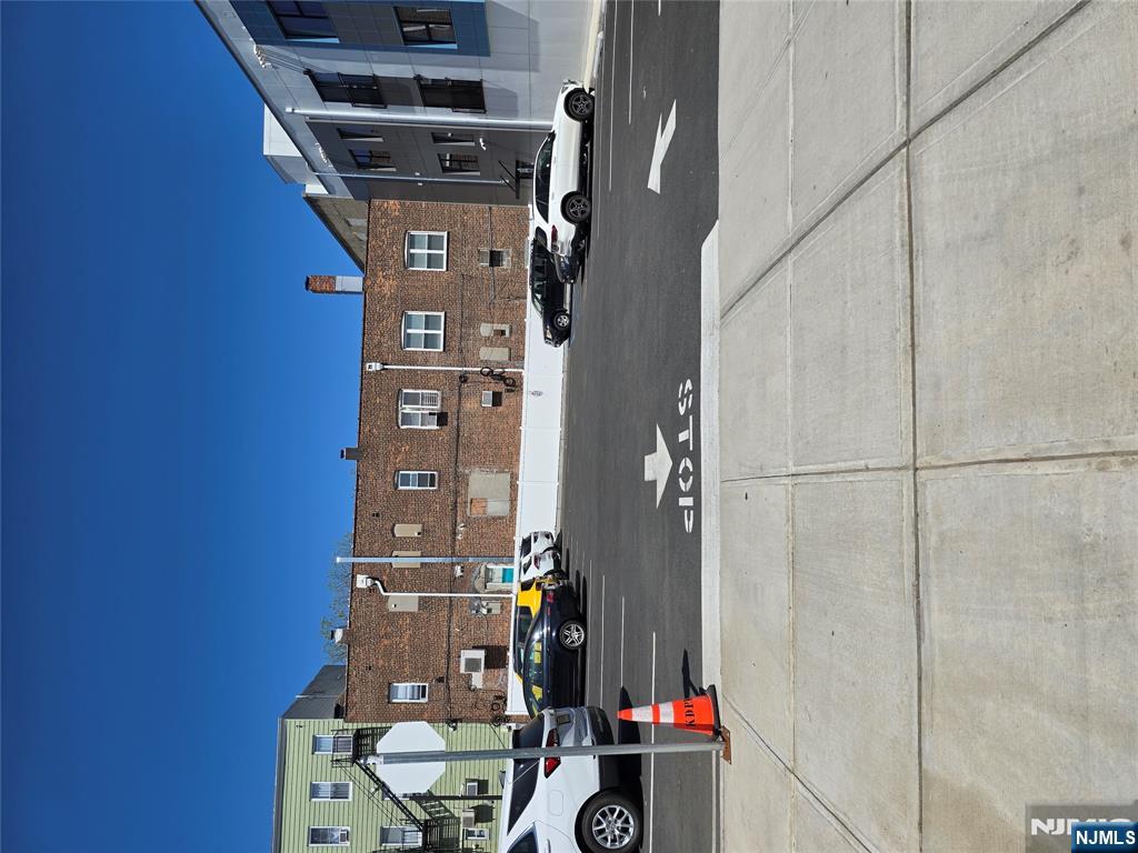 512 Kearny Avenue, Unit 202 Kearny, NJ 07032 - Photo 13 of 13 a view of a street with cars