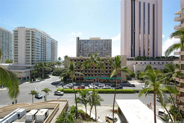 a view of a city with tall buildings