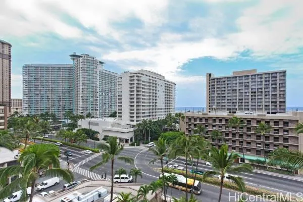 a view of a city with tall buildings