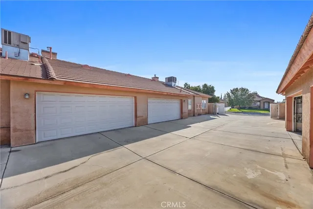 a view of a street with a building in the background
