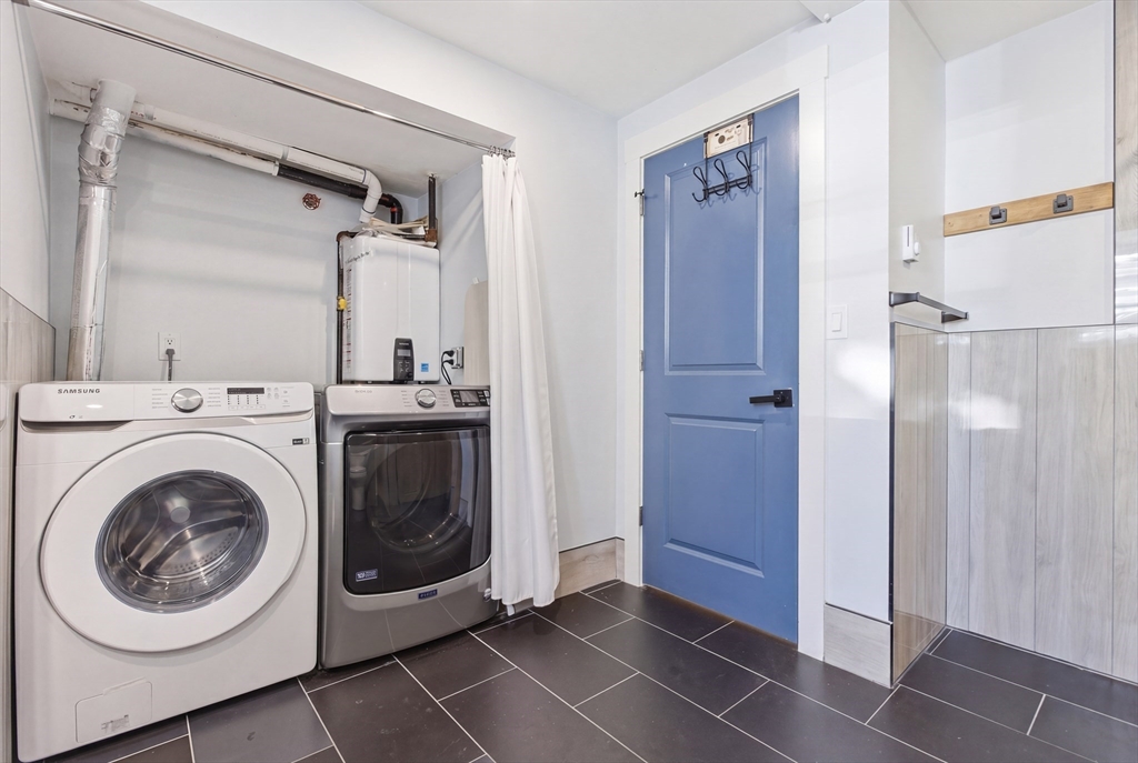 61 Shepton Street Boston, MA 02124 - Photo 35 of 41 a utility room with closet dryer and washer