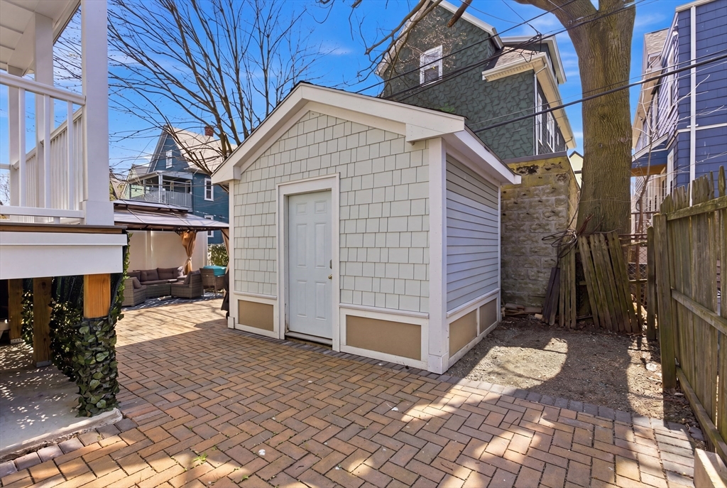 61 Shepton Street Boston, MA 02124 - Photo 39 of 41 a view of a house with a yard