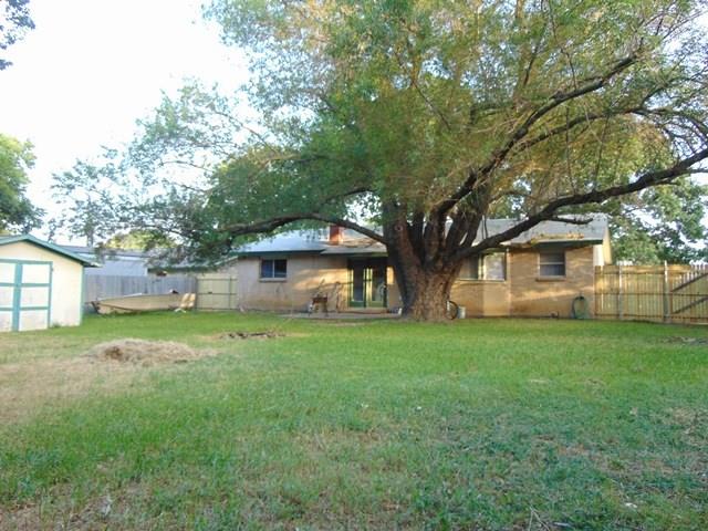 1201 Rambler Road Arlington, TX 76014 - Photo 15 of 15 a front view of a house with a garden
