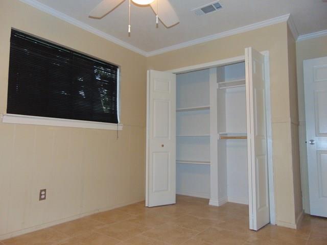 1201 Rambler Road Arlington, TX 76014 - Photo 10 of 15 a view of an empty room with a cabinet
