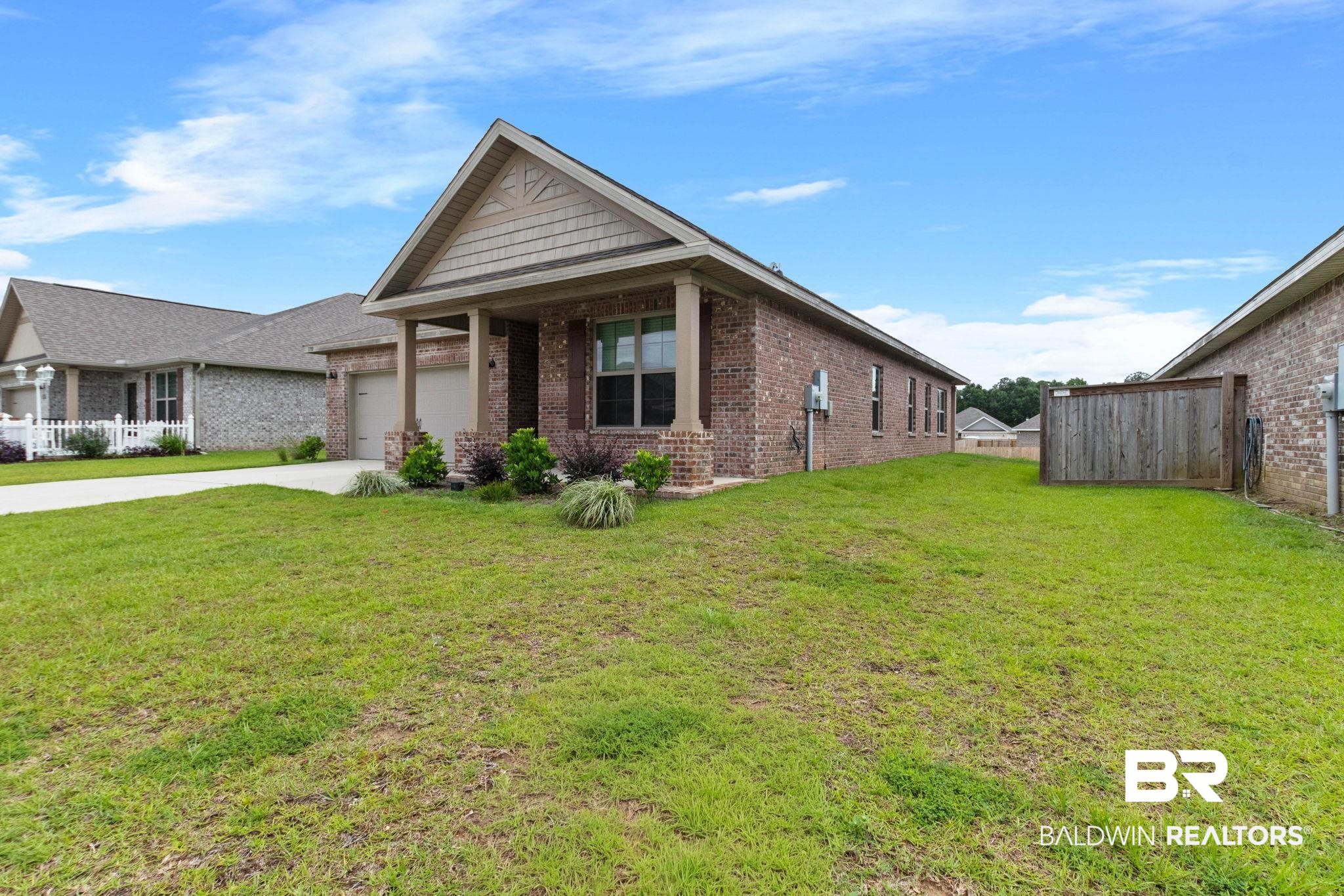 1710 Grouse Street Foley, AL 36535 - Photo 10 of 76 Brick exterior with gabled roofline and decorative shingle accents