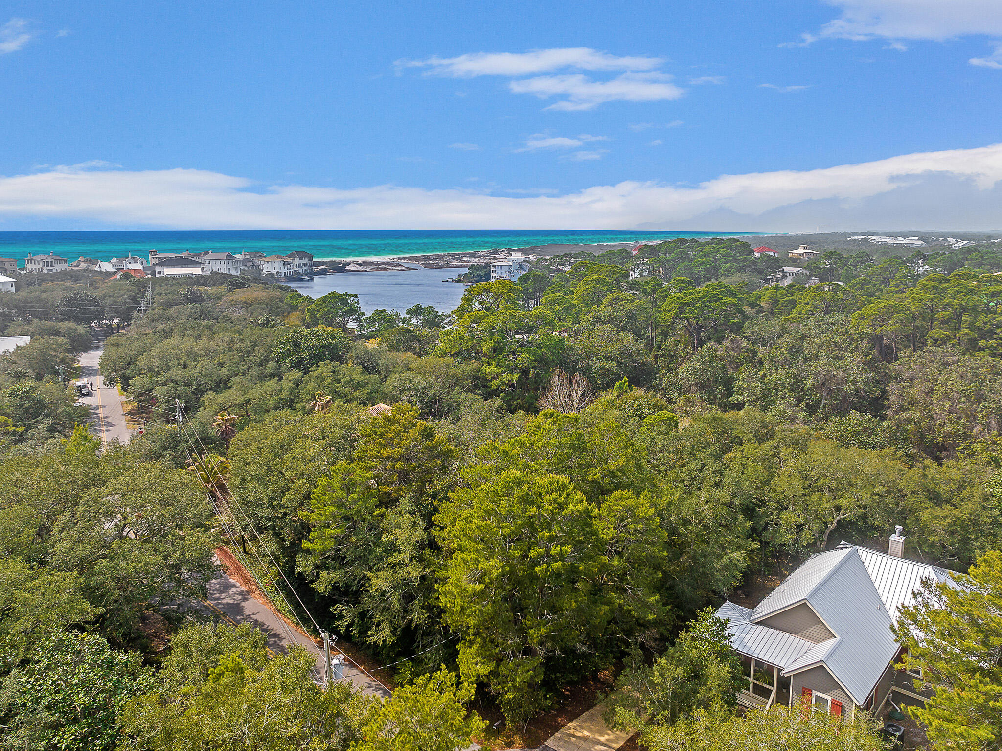 Lot 6 North Bishop Road Santa Rosa Beach, FL 32459 - Photo 11 of 18 a view of a city with lush green forest