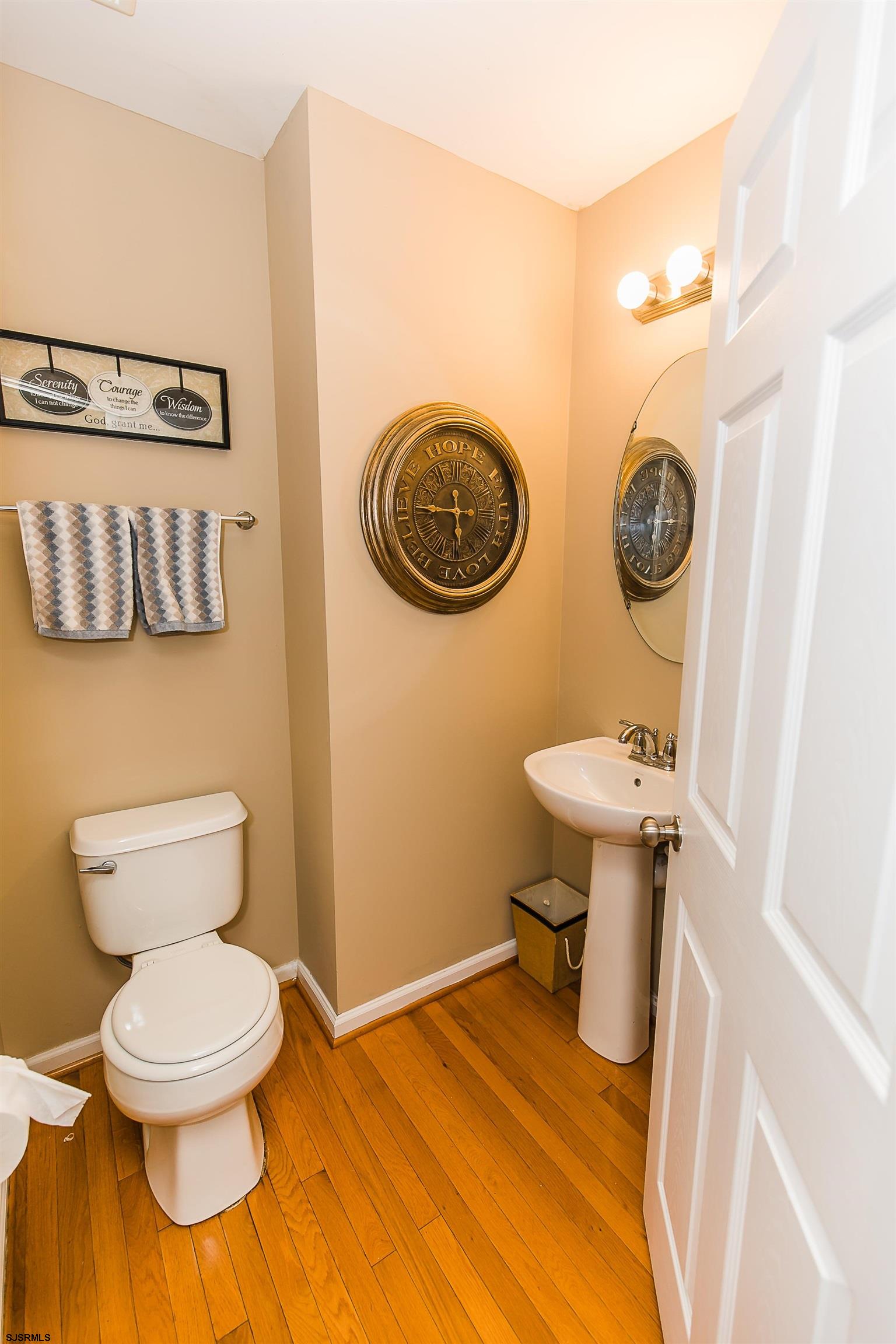 16 Cottage Road Egg Harbor Township, NJ 08234 - Photo 15 of 24 a bathroom with a toilet and a sink