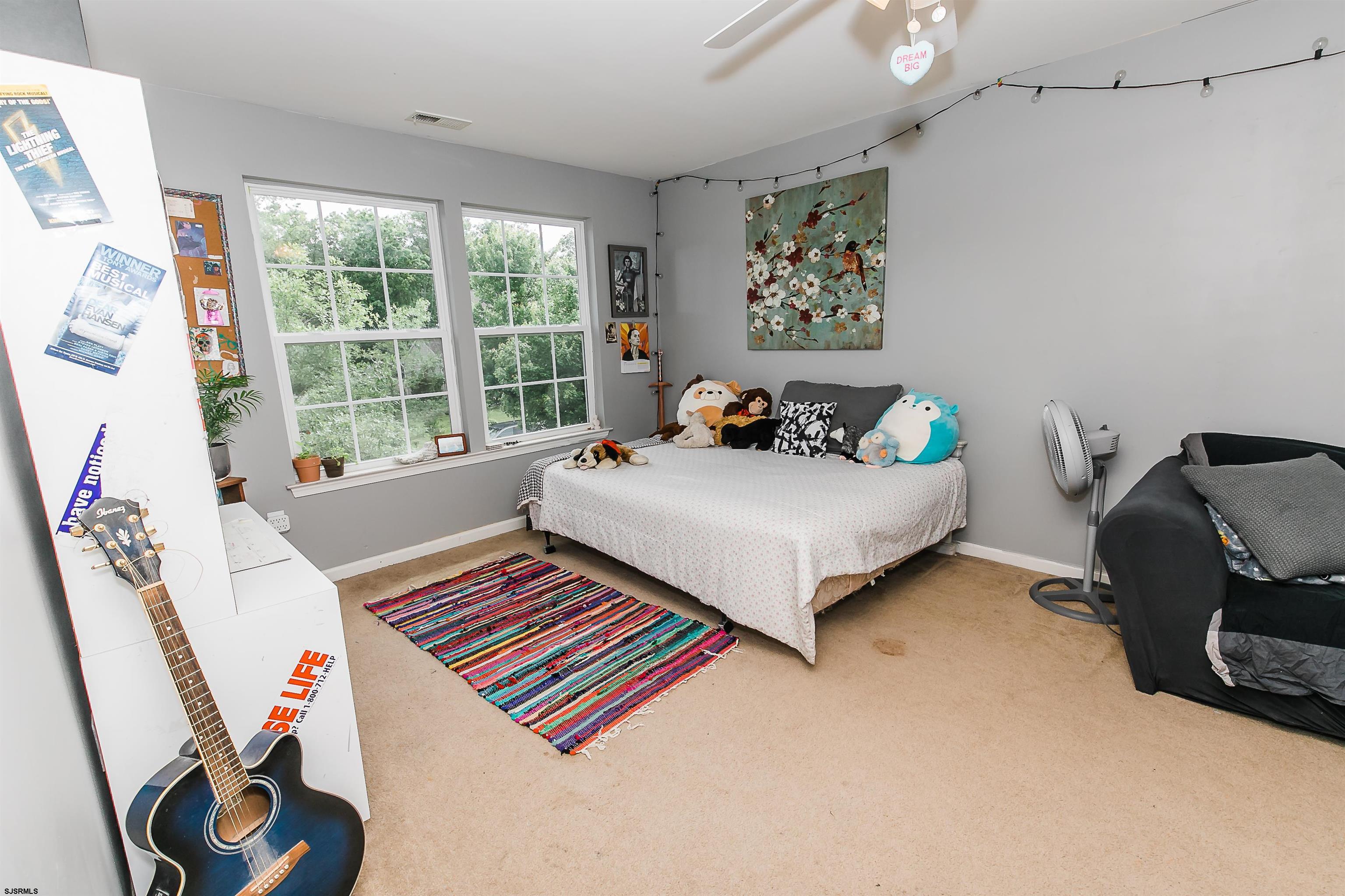 16 Cottage Road Egg Harbor Township, NJ 08234 - Photo 20 of 24 a bedroom with furniture and a window
