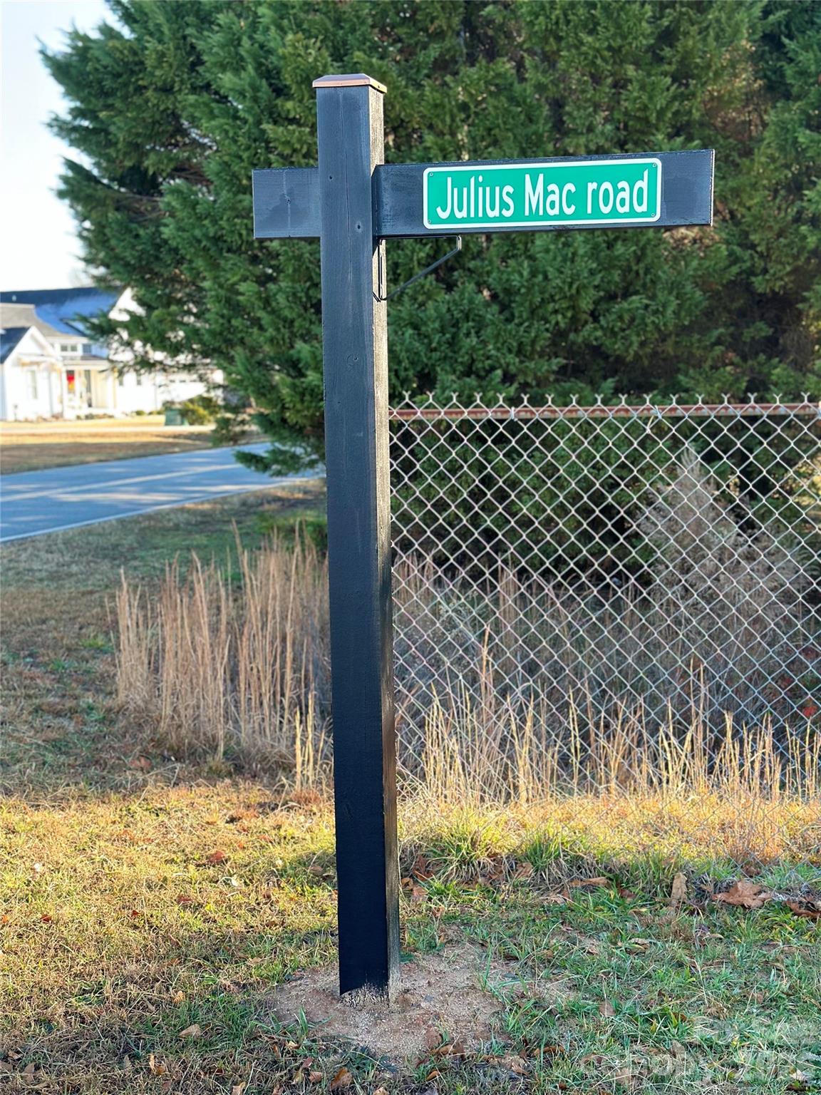 122 Julius Mac Road Stanley, NC 28164 - Photo 12 of 17 a sign board with wooden fence