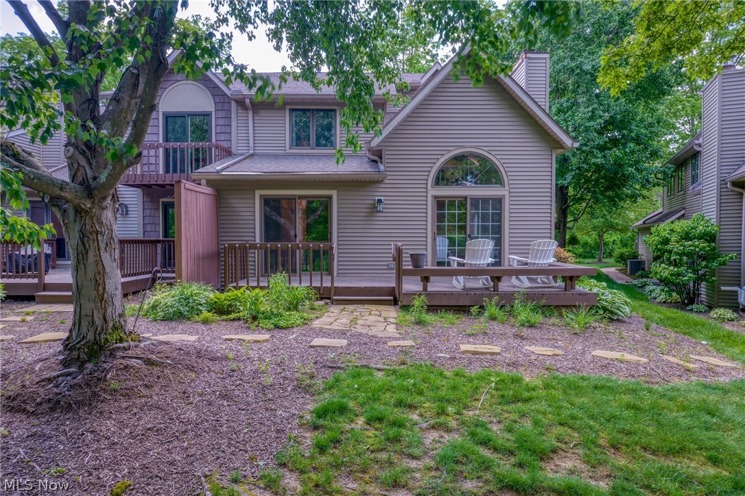 73 Lethbridge Lane Akron, OH 44321 - Photo 40 of 44 Rear View of the home from the pond