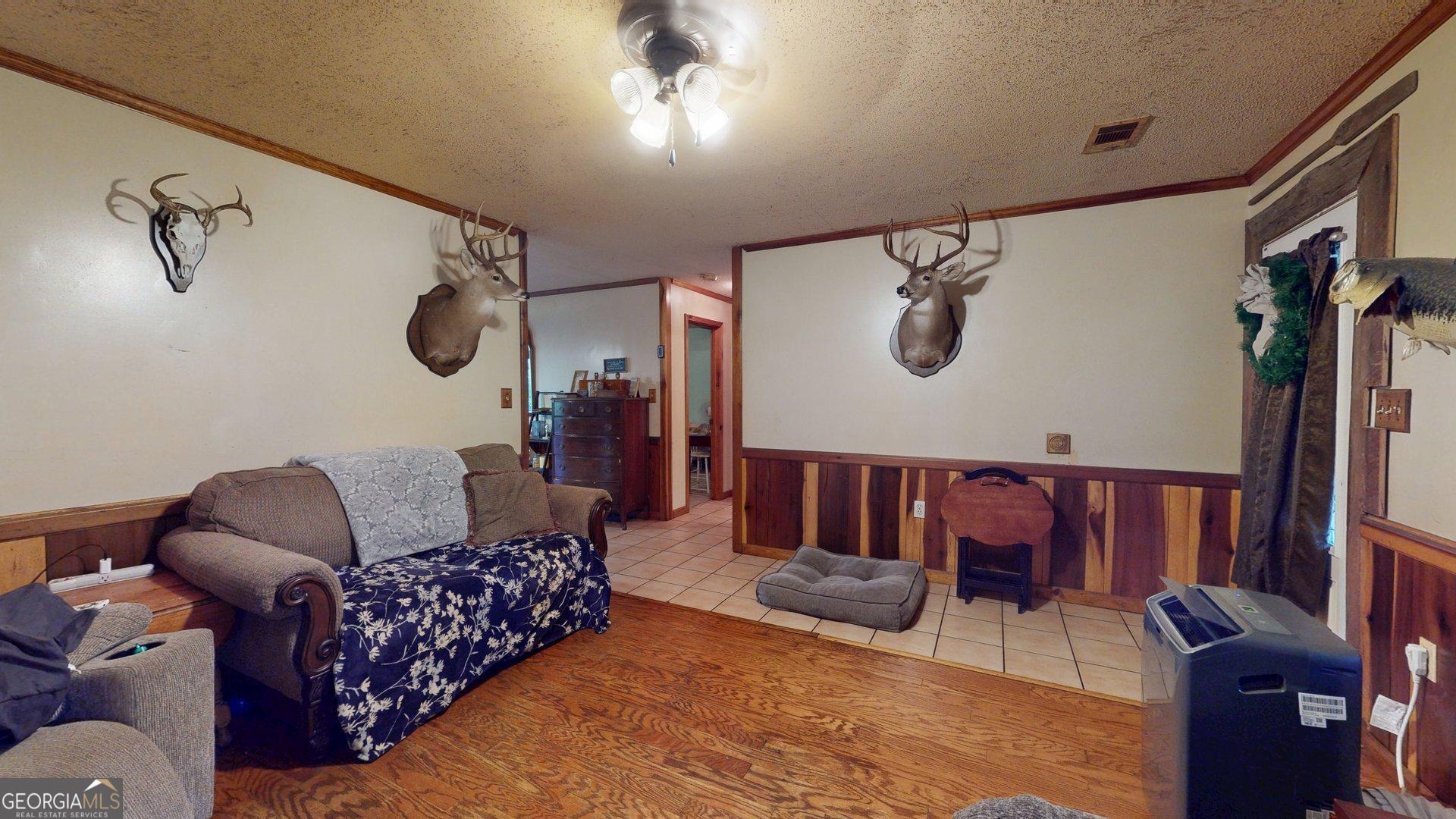 450 Bellevue Plantation Road Millen, GA 30442 - Photo 22 of 25 a living room with furniture