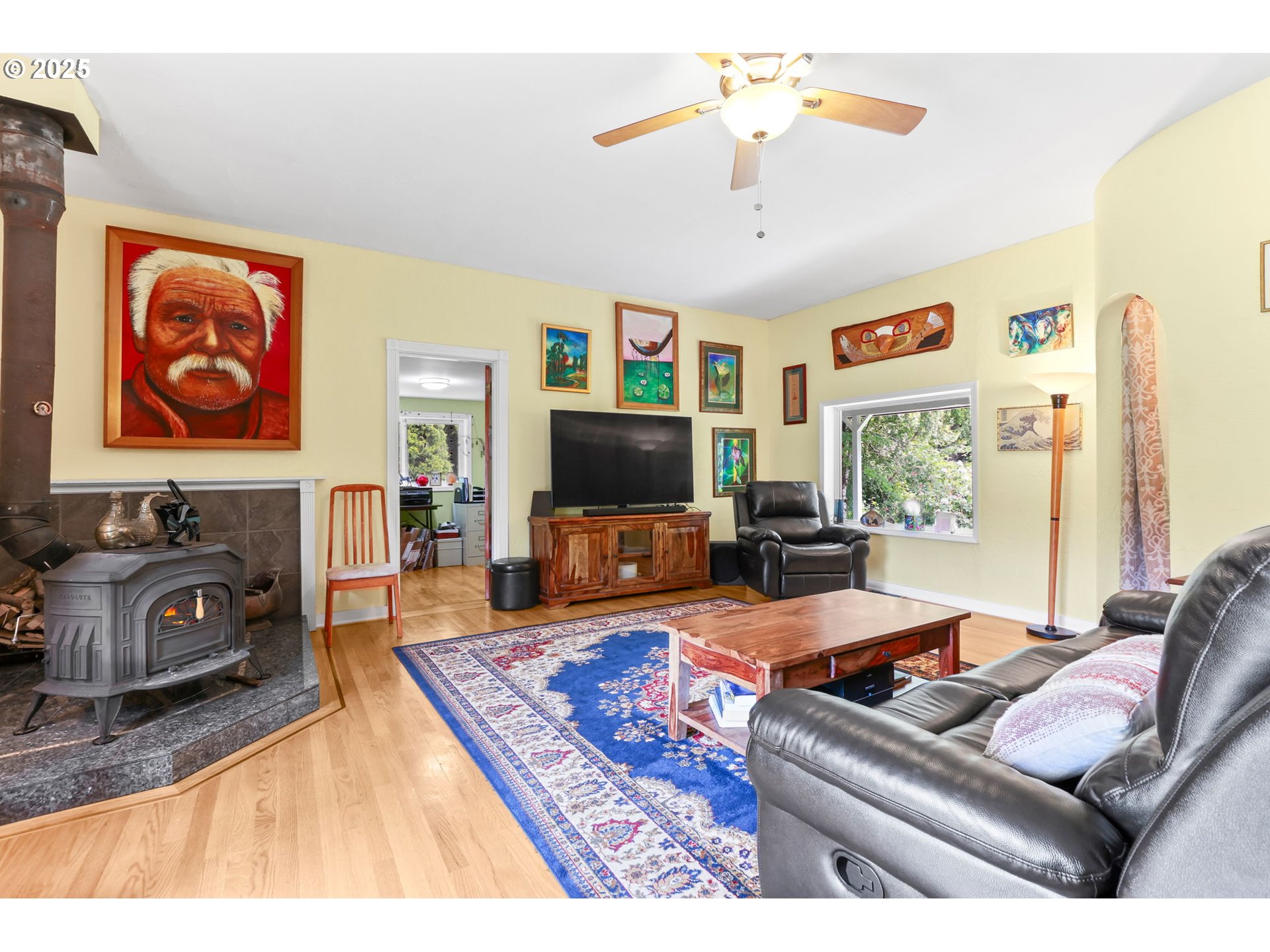 26011 South Morgan Road Estacada, OR 97023 - Photo 11 of 48 a living room with furniture and a flat screen tv