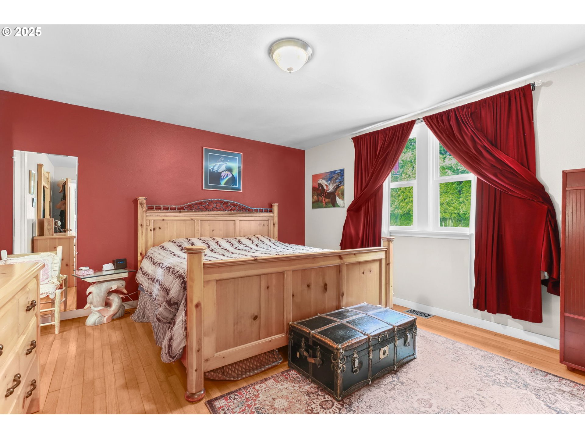 26011 South Morgan Road Estacada, OR 97023 - Photo 19 of 48 a living room with a bed furniture and a window