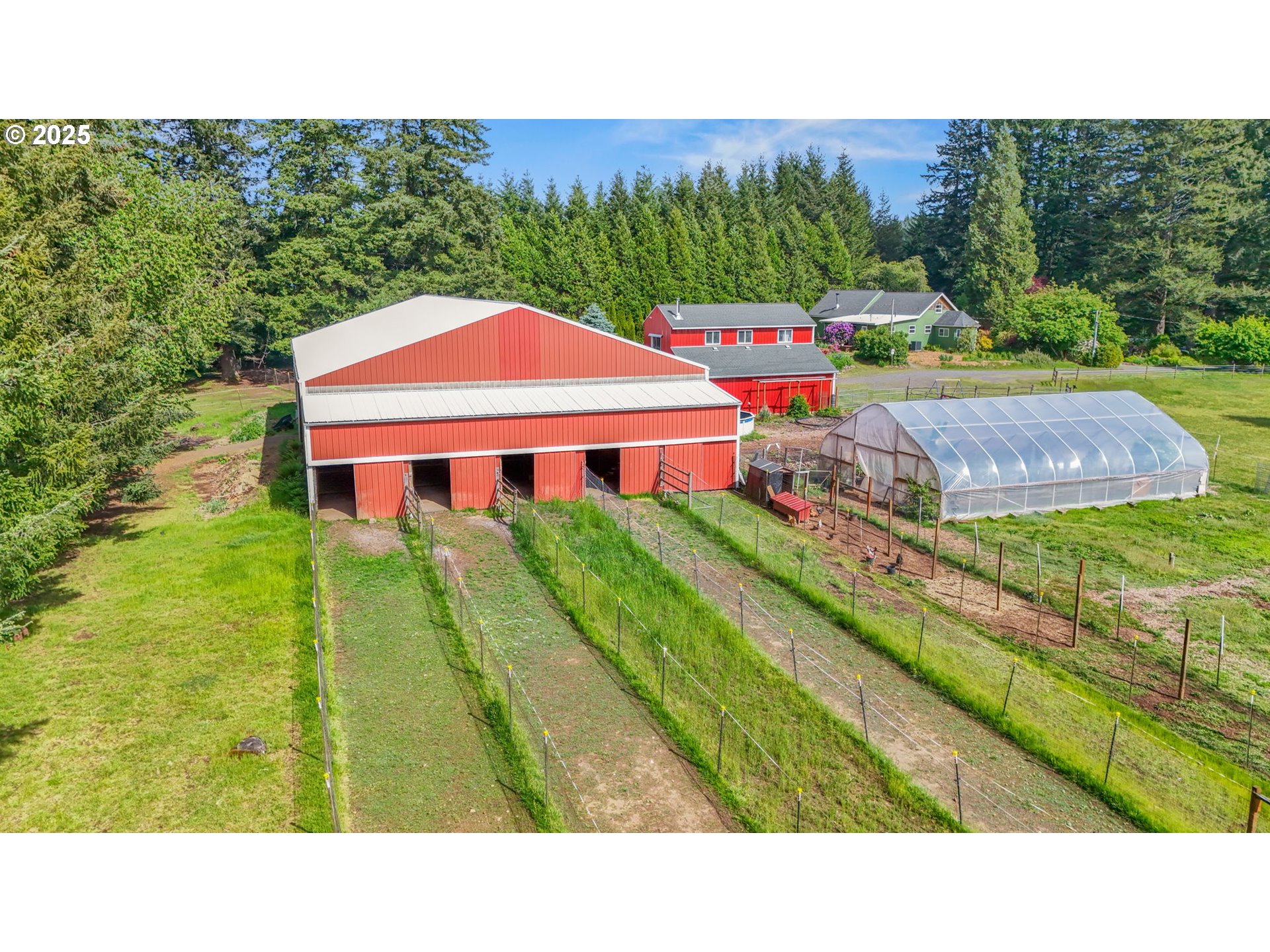 26011 South Morgan Road Estacada, OR 97023 - Photo 34 of 48 a backyard of a house with table and chairs