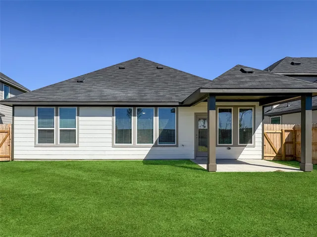 a view of a house with a garden