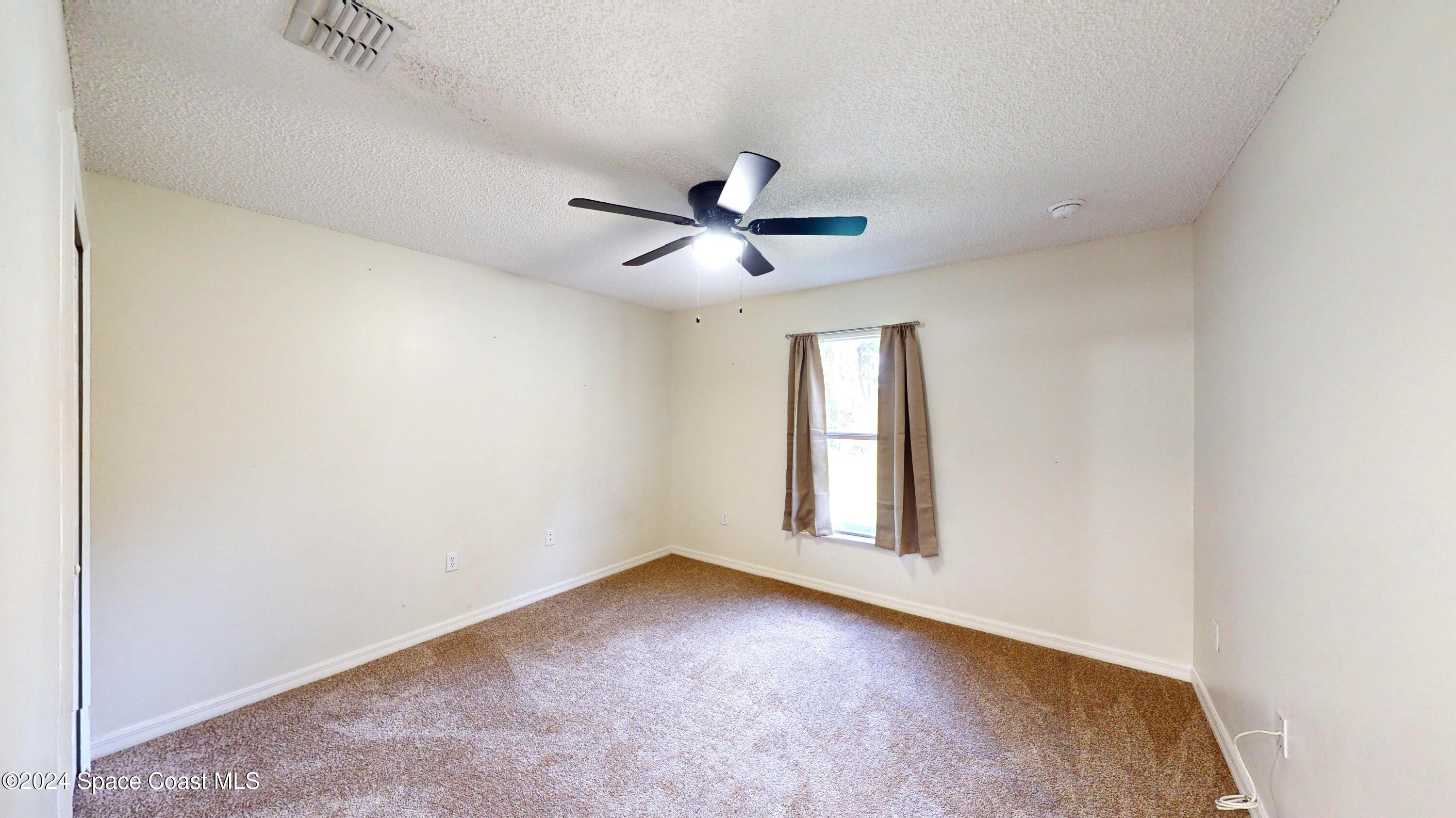 531 Scenic Road Palm Bay, FL 32908 - Photo 25 of 28 531-Scenic-Rd-SW-11052024_123400