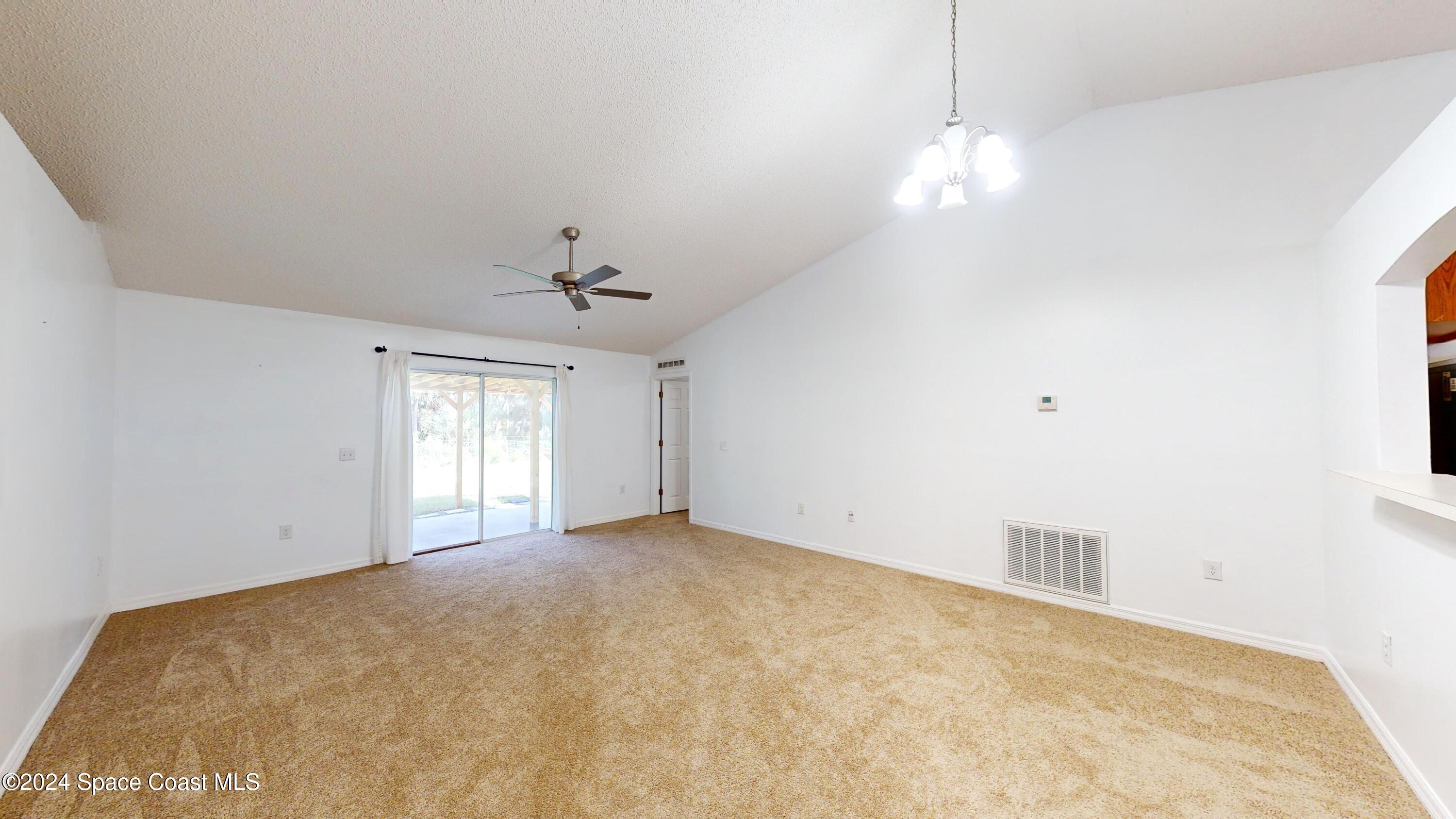 531 Scenic Road Palm Bay, FL 32908 - Photo 4 of 28 531-Scenic-Rd-SW-LivingDining-Room