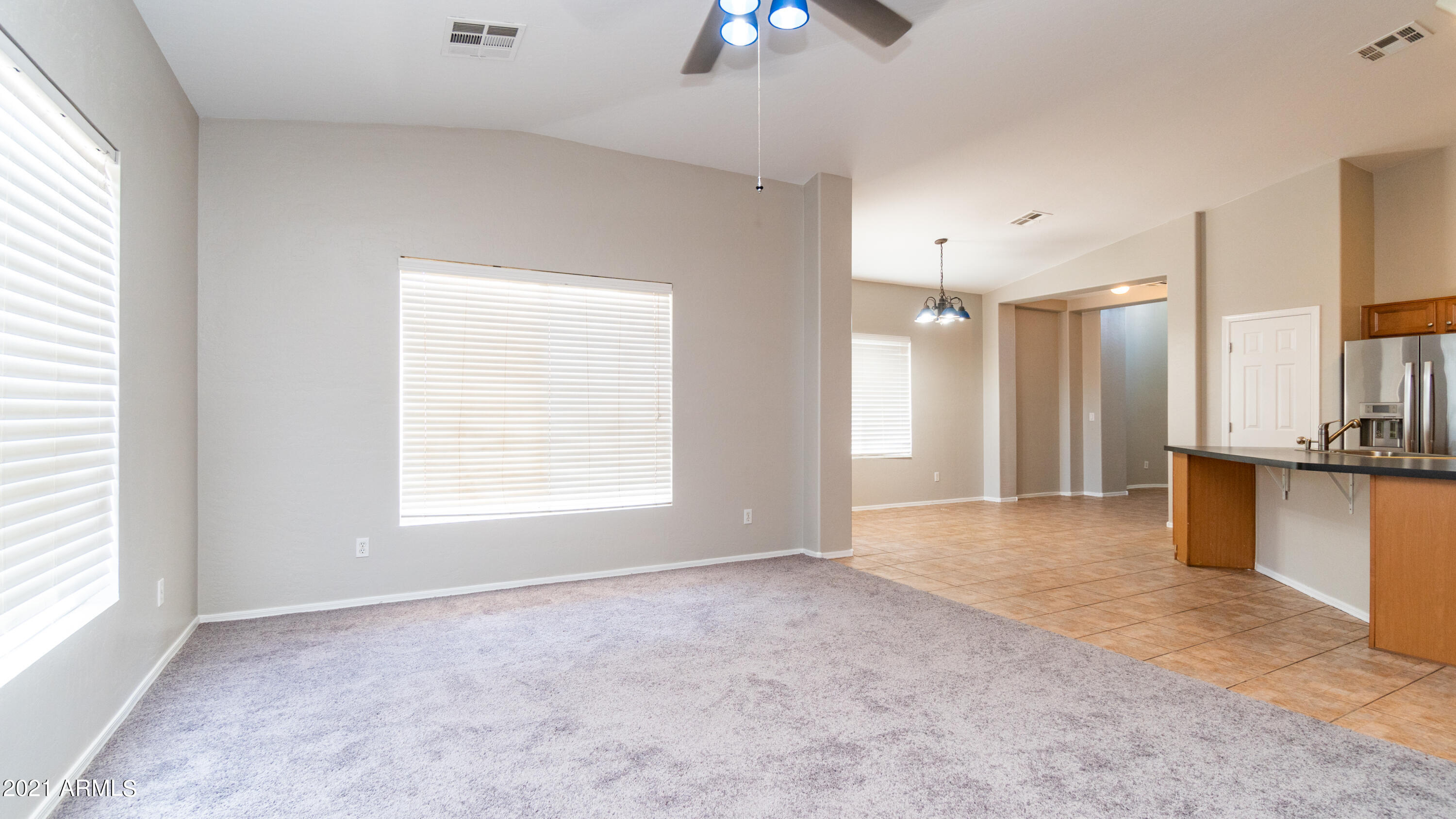 14843 West Wethersfield Road Surprise, AZ 85379 - Photo 11 of 28 Living room