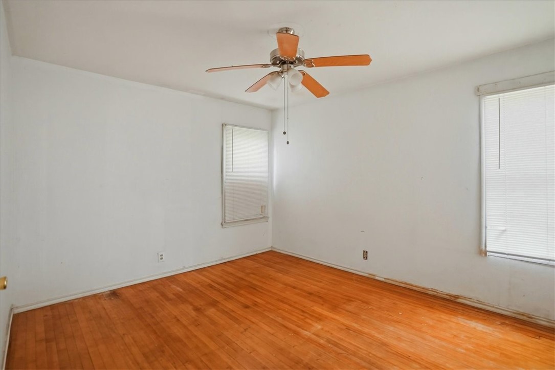 3633 Chestnut Street Corpus Christi, TX 78411 - Photo 22 of 22 wooden floor in an empty room