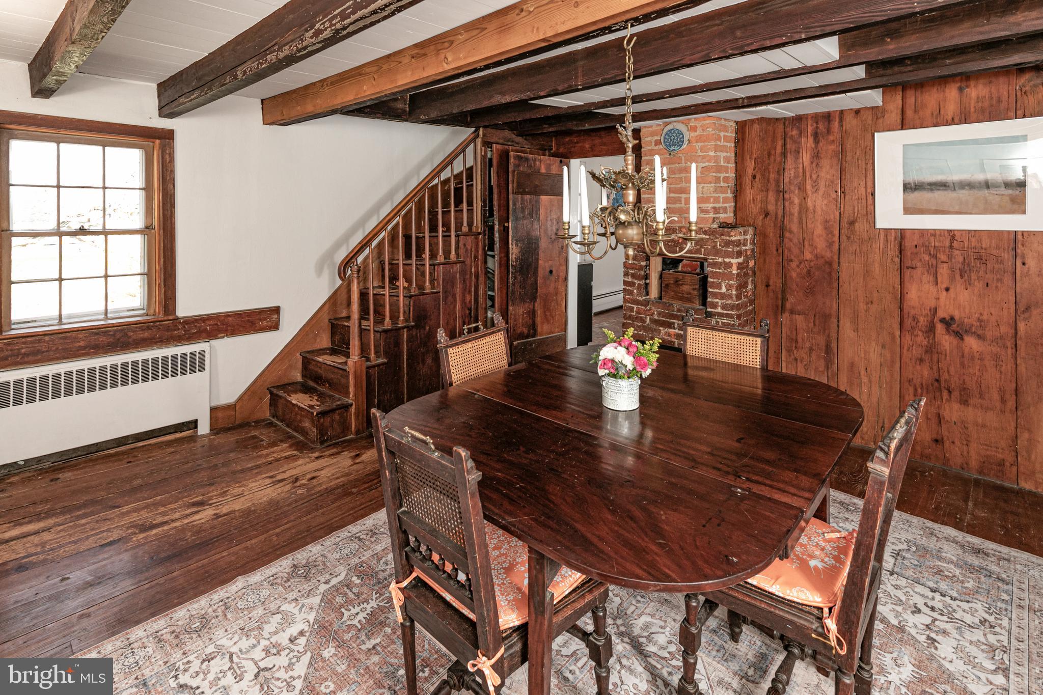 210 Cold Soil Road Princeton, NJ 08540 - Photo 12 of 37 a view of a dining room with furniture wooden floor and front door