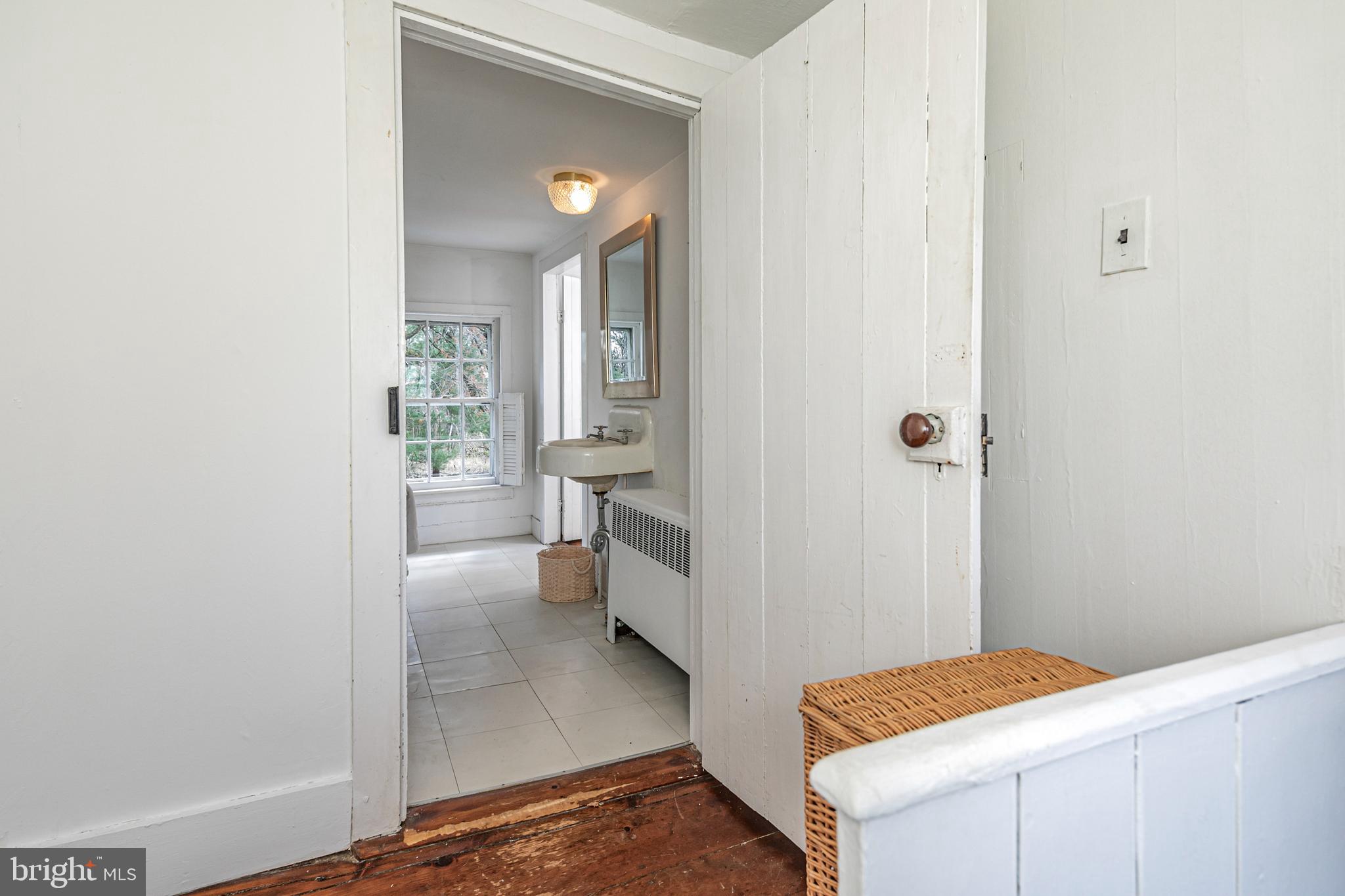 210 Cold Soil Road Princeton, NJ 08540 - Photo 26 of 37 a room with a bed and a view of bathroom