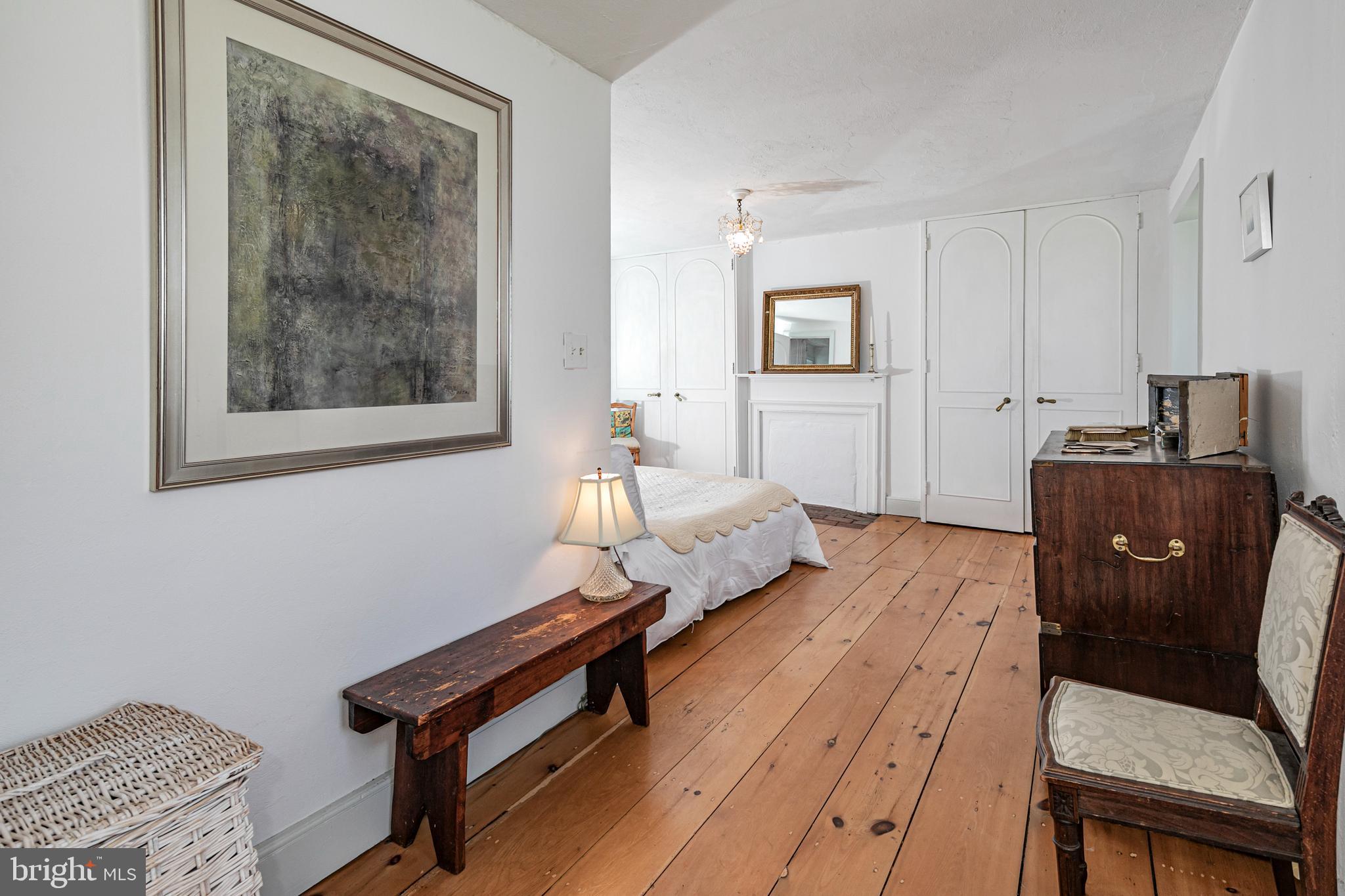 210 Cold Soil Road Princeton, NJ 08540 - Photo 28 of 37 a bedroom with furniture and wooden floor